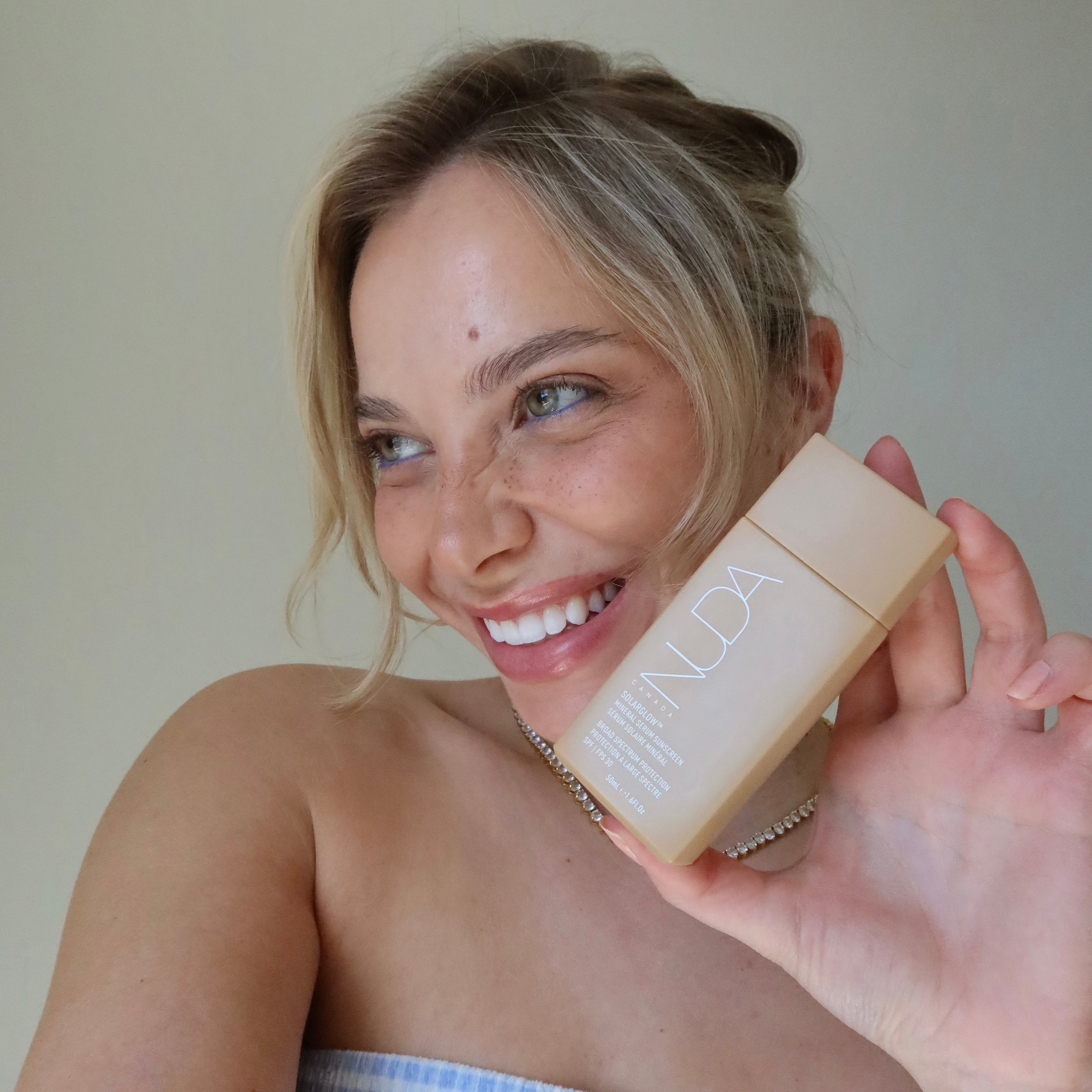 Suncare Redefined By Nuda: New SOLARGLOW™ Mineral Serum Sunscreen
